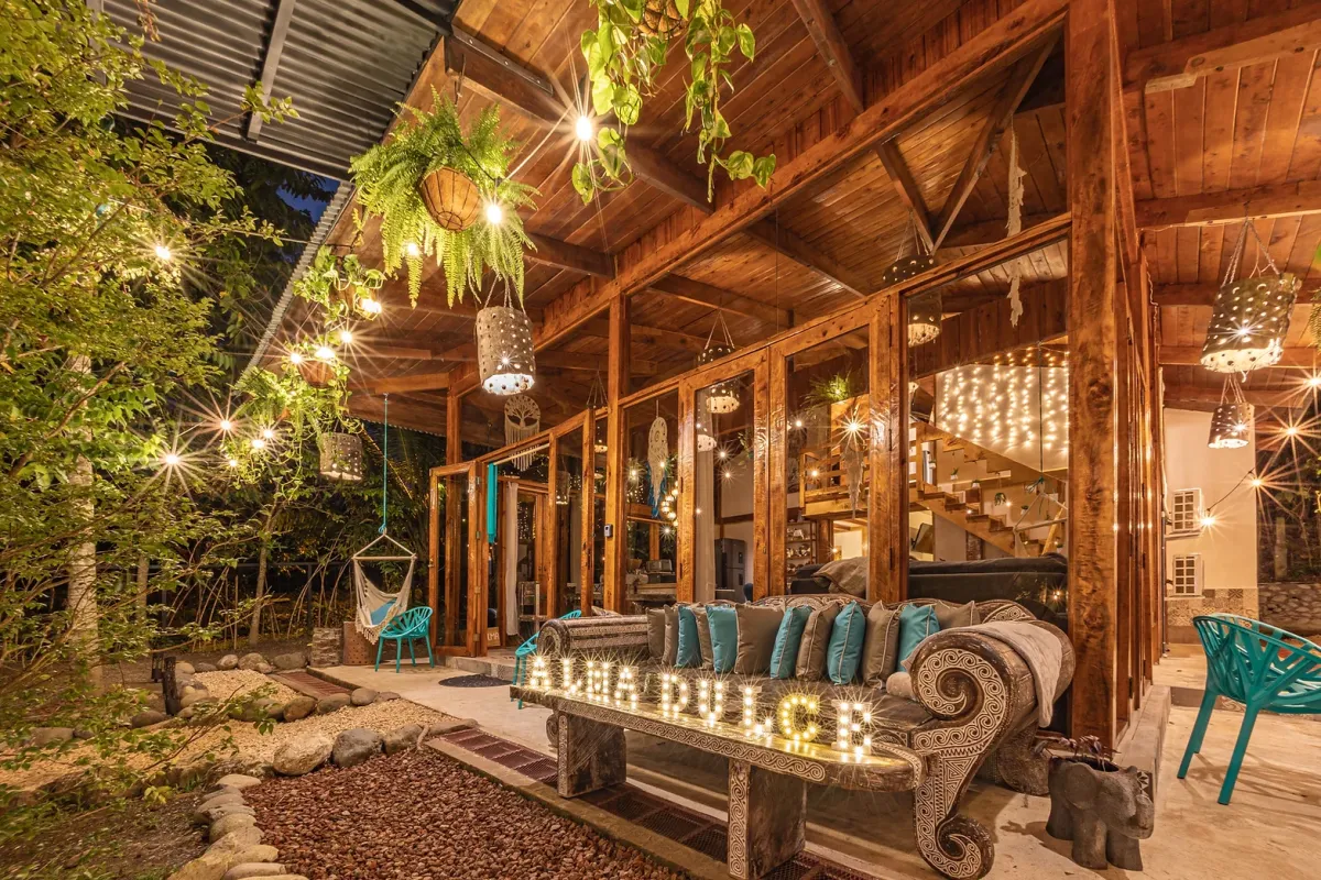 Villa exterior patio with Wanderlust sign